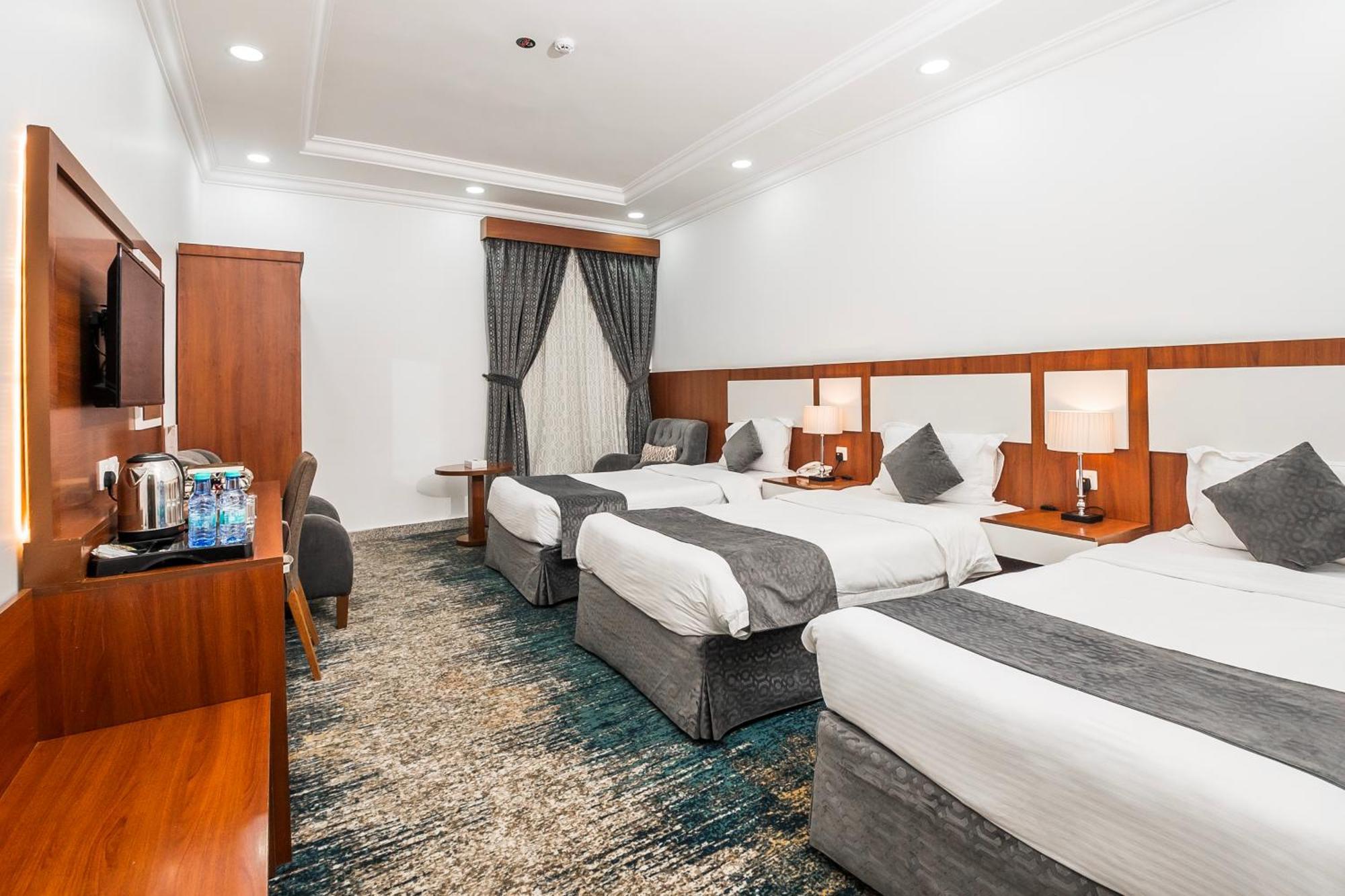 Deluxe Triple Room